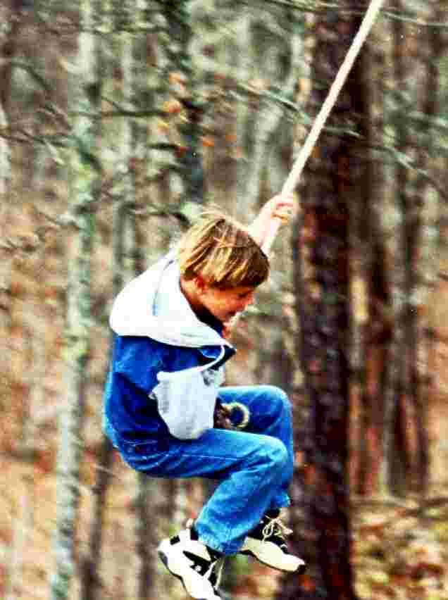 sean swinging at the farm